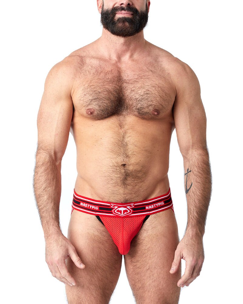 male model wearing impulse jock red from nasty pig